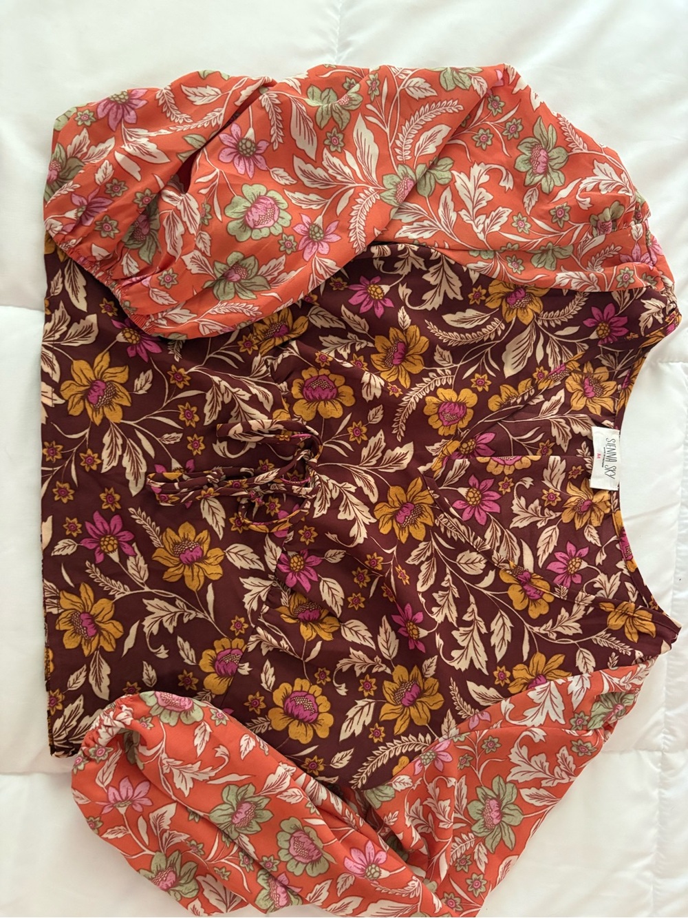 Sienna Sky Coral and Burgundy Floral Mixed-Print Blouse